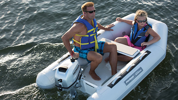 A boat speeding across the water 