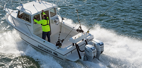 Image of two men fishing in a boat 