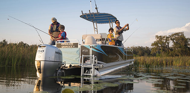 A family fishing off a boat at duck